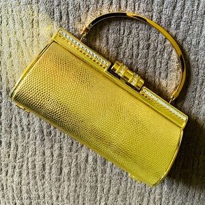 Gold evening clutch w/diamond studs